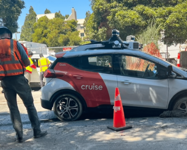 An autonomous taxi unfortunately gets stuck in still wet concrete